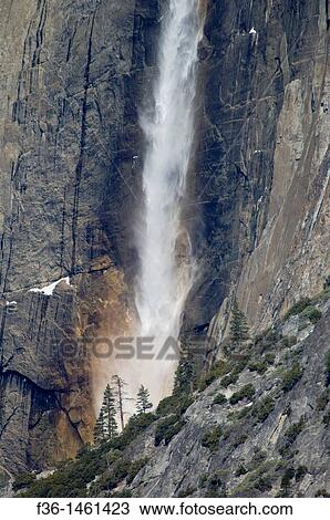 Stock Image - Rainbow in Upper Yosemite Fall, Yosemite Valley, Yosemite National Park, California. Fotosearch
