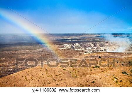 rainbow over actively erupting Halemaumau Crater, releasing vog - volcanic gas, Kilauea Caldera, Hawaii Volcanoes National Park, Kilauea, Big Island, Hawaii, USA View Large Photo Image Stock Image - rainbow over actively erupting Halemaumau Crater, releasing vog - volcanic gas, Kilauea Caldera, Hawaii Volcanoes National Park, Kilauea, Big Island, Hawaii, USA. Fotosearch