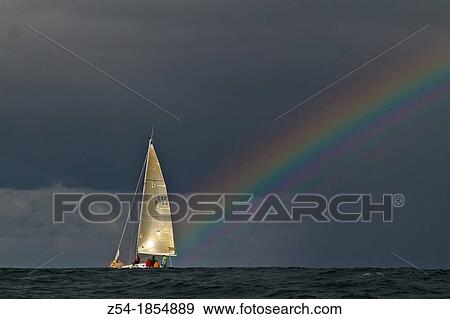 Stock Photo - Rainbow over Bay of Biscay, Spain. Fotosearch