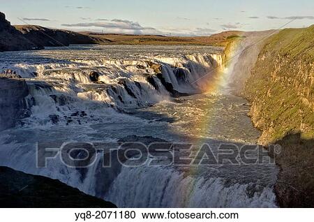 Rainbow over Golden Waterfalls, Gulfoss, Iceland View Large Photo Image Stock Image - Rainbow over Golden Waterfalls, Gulfoss, Iceland. Fotosearch