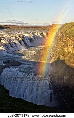 Rainbow over Golden Waterfalls, Gulfoss, Iceland View Large Photo Image Stock Photo - Rainbow over Golden Waterfalls, Gulfoss, Iceland. Fotosearch