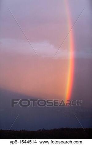 rainbow over Lake Thun while sunset, Bernese Oberland, Switzerland View Large Photo Image Picture - rainbow over Lake Thun while sunset, Bernese Oberland, Switzerland. Fotosearch