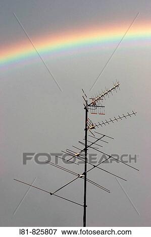Rainbow over TV antenna. Corvera de Asturias, Asturias, Spain View Large Photo Image Stock Photo - Rainbow over TV antenna. Corvera de Asturias, Asturias, Spain. Fotosearch
