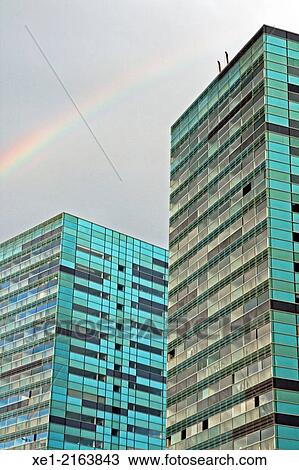 Stock Image - Rainbow, residential buildings, L? Hospitalet de Llobregat, Catalonia, Spain. Fotosearch