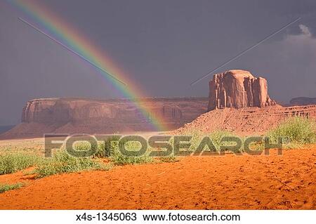 Stock Image - Rainbow's end in Monument Valley, Navajo Nation, USA. Fotosearch