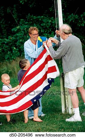 Stock Photograph - Raising US flag. Medevi. Sweden. Fotosearch