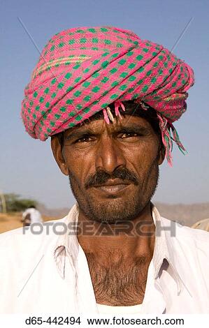 Rajasthani Camel Seller. Pushkar camel fair. Pushkar. Rajasthan. India. View Large Photo Image Picture - Rajasthani Camel Seller. Pushkar camel fair. Pushkar. Rajasthan. India.. Fotosearch