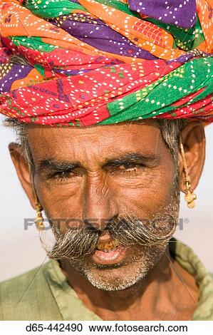 Rajasthani Camel Seller. Pushkar camel fair. Pushkar. Rajasthan. India. View Large Photo Image Stock Image - Rajasthani Camel Seller. Pushkar camel fair. Pushkar. Rajasthan. India.. Fotosearch