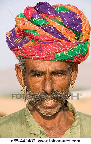 Rajasthani Camel Seller. Pushkar camel fair. Pushkar. Rajasthan. India. View Large Photo Image Stock Photo - Rajasthani Camel Seller. Pushkar camel fair. Pushkar. Rajasthan. India.. Fotosearch