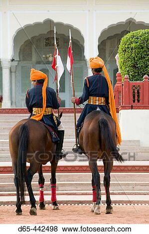 Stock Photo - Rambagh Palace Hotel. Uniformed Rajasthani Horsemen. Jaipur. Rajasthan. India.. Fotosearch