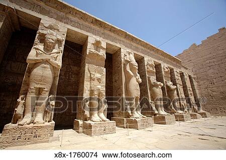 Ramessid columns in the peristyle court of temple of Ramesses III of Medinet Habu, Luxor, Egypt View Large Photo Image Picture - Ramessid columns in the peristyle court of temple of Ramesses III of Medinet Habu, Luxor, Egypt. Fotosearch