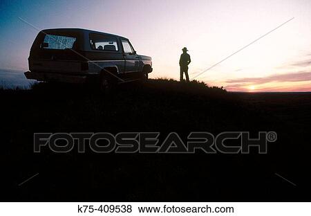 Rancher, his van and his ranch. Montana, USA View Large Photo Image Stock Photo - Rancher, his van and his ranch. Montana, USA. Fotosearch