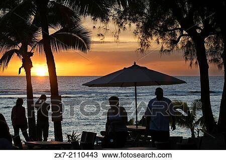 Rarotonga Island. Cook Island. Polynesia. South Pacific Ocean. Sunset on the beach in Hotel Crown Beach Resort & Spa. Lit. View Large Photo Image Stock Image - Rarotonga Island. Cook Island. Polynesia. South Pacific Ocean. Sunset on the beach in Hotel Crown Beach Resort & Spa. Lit.. Fotosearch