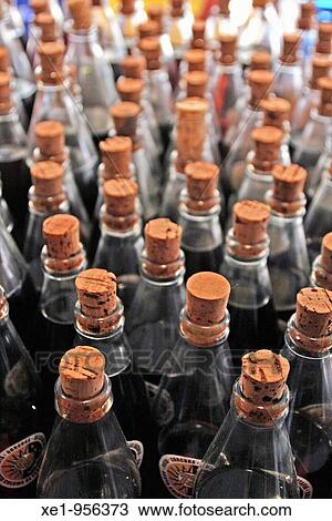 Stock Image - Ratafia liquor bottles to taste, Fira de la Ratafia? 09, Santa Coloma de Farners, Catalonia, Spain.. Fotosearch