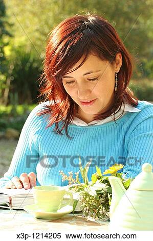 Stock Photography - Reading a book. Fotosearch