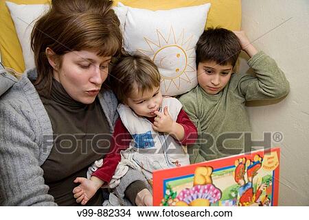 Reading Evening Family View Large Photo Image Picture - Reading Evening Family. Fotosearch