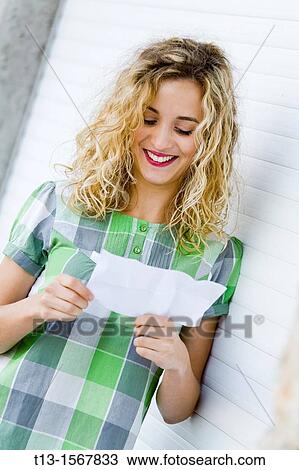 Reading paper note student girl View Large Photo Image Stock Image - Reading paper note student girl. Fotosearch