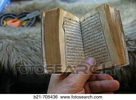 Reading the Holy book, the Kuran. Cairo. Egypt. View Large Photo Image Stock Photograph - Reading the Holy book, the Kuran. Cairo. Egypt.. Fotosearch