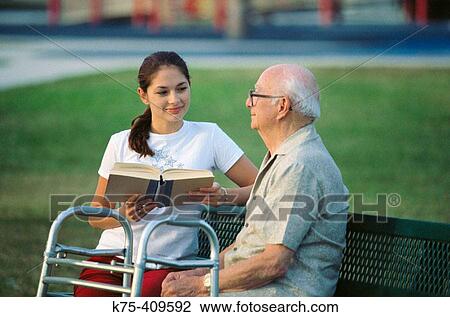 Reading to grandpa View Large Photo Image Stock Image - Reading to grandpa. Fotosearch