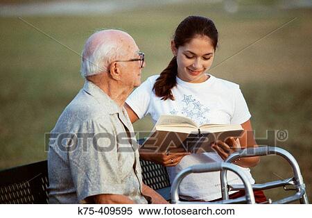 Reading to grandpa View Large Photo Image Stock Photography - Reading to grandpa. Fotosearch