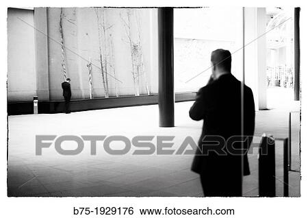 rear view of a executive relaxed smoking in the street, London, England, UK View Large Photo Image Stock Photograph - rear view of a executive relaxed smoking in the street, London, England, UK. Fotosearch