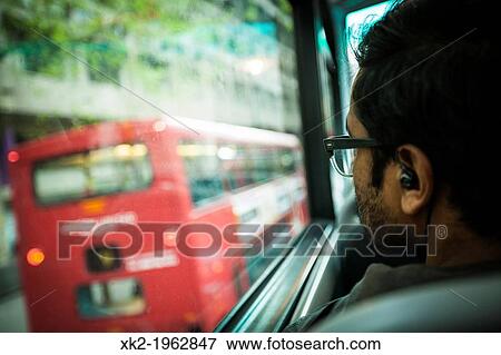 Recalling during the bus journey, London, UK View Large Photo Image Stock Photo - Recalling during the bus journey, London, UK. Fotosearch