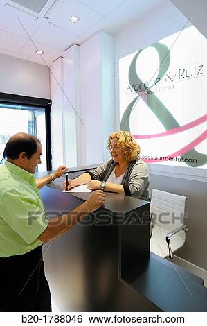 Stock Photograph - Reception, Dental office/Dental surgery, Donostia-San SebastiBn, Guipuzcoa, Basque Country, Spain. Fotosearch