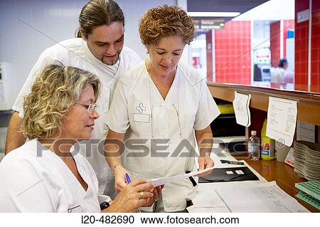 Stock Image - Reception desk, ambulatory care service, clinical tests. Hospital Universitario Gran Canaria Doctor Negrin, Las Palmas de Gran Canaria. Canary Islands, Spain. Fotosearch