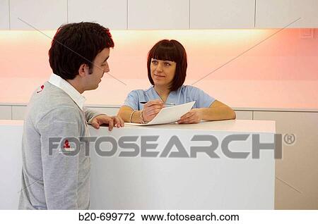 Reception desk in dental clinic View Large Photo Image Stock Image - Reception desk in dental clinic. Fotosearch