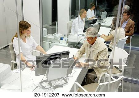 Stock Photo - Reception of patients, Onkologikoa Hospital, Oncology Institute, Case Center for prevention, diagnosis and treatment of cancer, Donostia, San Sebastian, Gipuzkoa, Basque Country, Spain. Fotosearch