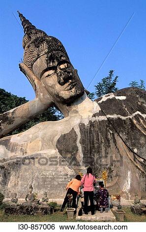 Reclining Buddha, Xieng Khuan (Buddha Park), Vientiane, Laos View Large Photo Image Stock Photograph - Reclining Buddha, Xieng Khuan (Buddha Park), Vientiane, Laos. Fotosearch