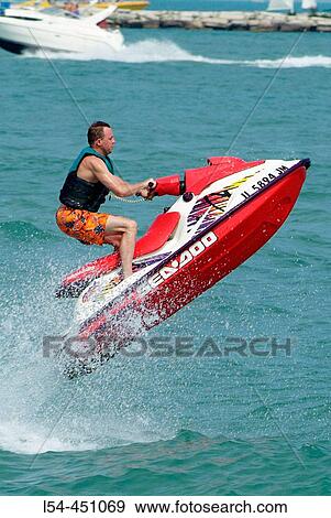 Stock Photo - Recreation and Relaxation on and about the Navy Pier on the Chicago Harbour and Lake Michigan at Chicago, Illinois. USA.. Fotosearch
