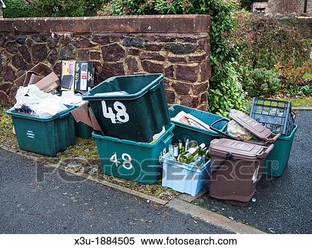 Recyling boxes outside homes waiting for collection View Large Photo Image Stock Photography - Recyling boxes outside homes waiting for collection. Fotosearch