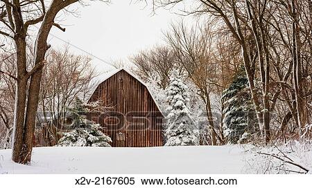 Red barn nestled amongst trees in fresh snow. View Large Photo Image Stock Photography - Red barn nestled amongst trees in fresh snow.. Fotosearch