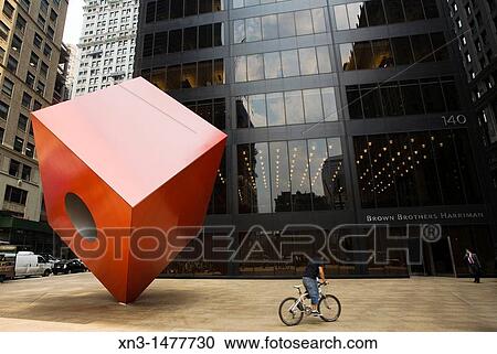 Red Cube, sculpture by Isama Noguchi in front of the Brown Brothers Harriman & Co bank, Financial District, Lower Manhattan, New York City, USA. View Large Photo Image Stock Image - Red Cube, sculpture by Isama Noguchi in front of the Brown Brothers Harriman & Co bank, Financial District, Lower Manhattan, New York City, USA.. Fotosearch