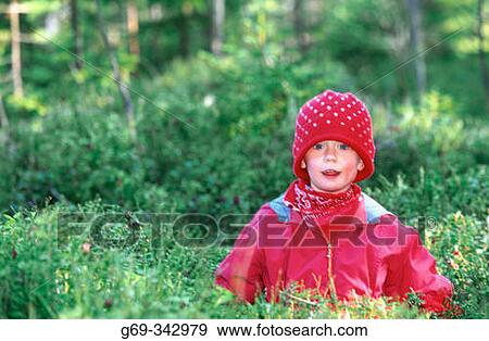 Red-dressed two year old girl in the forest. V? sterbotten, Sweden View Large Photo Image Stock Photo - Red-dressed two year old girl in the forest. V? sterbotten, Sweden. Fotosearch