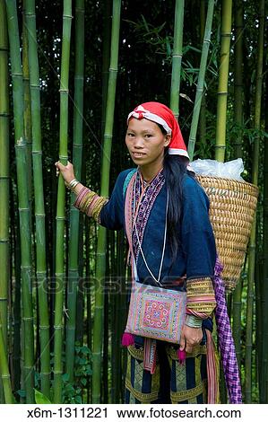 Stock Image - Red Dzao ethnic woman in Sapa-Ta Phin route Sapa, Lao Cai province, Vietnam. Fotosearch