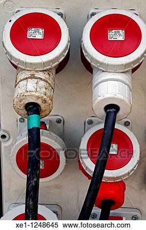 Red electrical outlets. View Large Photo Image Stock Photography - Red electrical outlets.. Fotosearch