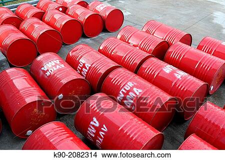Picture - Red fuel drums of AMA - Mission Flight at the airport of Jayapura in Sentani, Papua, Indonesia, Southeast Asia.. Fotosearch