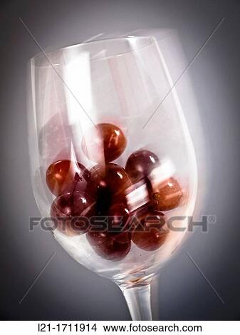 Red grapes in wine glass View Large Photo Image Picture - Red grapes in wine glass. Fotosearch