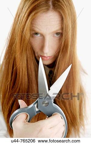 Red hair woman with scissors View Large Photo Image Stock Photograph - Red hair woman with scissors. Fotosearch