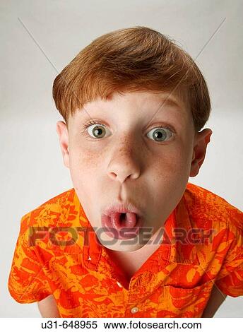 Red haired boy sticking his tongue out View Large Photo Image Stock Photography - Red haired boy sticking his tongue out. Fotosearch