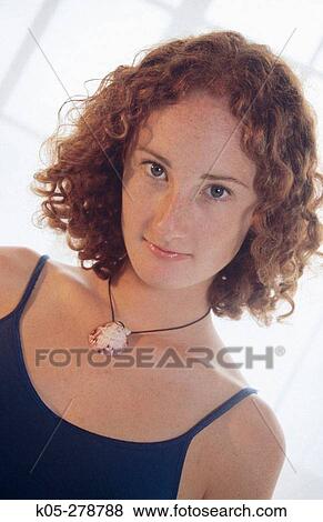 Red haired girl with cameo View Large Photo Image Stock Photo - Red haired girl with cameo. Fotosearch