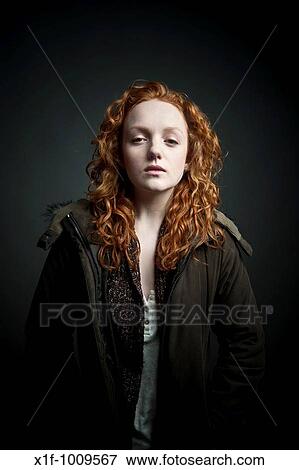 Stock Photo - red haired young woman. Fotosearch