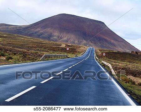 Stock Photo - Red mountain, Corralejo, Fuerteventura, Canary Islands, Spain.. Fotosearch