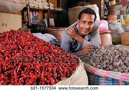Red peppers and other spices at the Mercato, perhaps world largest open air market, at Addis Ababa, Ethiopia View Large Photo Image Picture - Red peppers and other spices at the Mercato, perhaps world largest open air market, at Addis Ababa, Ethiopia. Fotosearch