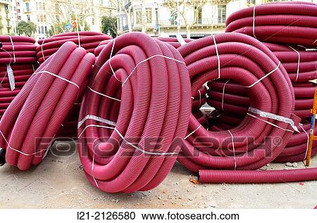 Red plastic tubing for construction. View Large Photo Image Stock Image - Red plastic tubing for construction.. Fotosearch