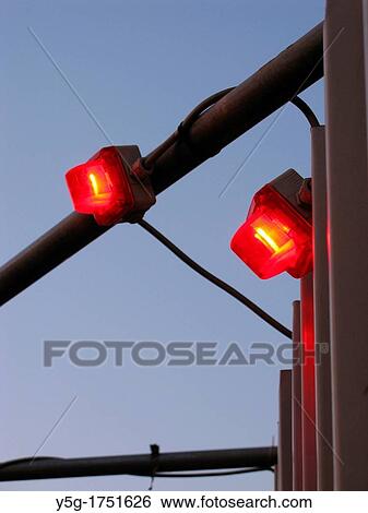 red safety light against blue sky View Large Photo Image Stock Photograph - red safety light against blue sky. Fotosearch