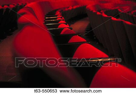 Red theatre seats in rows View Large Photo Image Stock Image - Red theatre seats in rows. Fotosearch