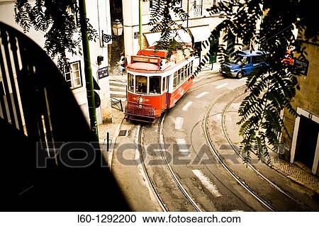 Stock Image - Red tram in Lisbon, Portugal. Fotosearch
